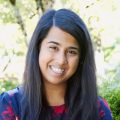 Pediatrician Nisha Baliga headshot - Pediatrician Nisha Baliga crossing her arms smiling at camera- Metro Pediatrics Clinic Portland Oregon